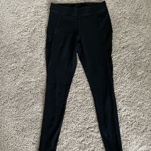 Express black sheer cutout side leggings.